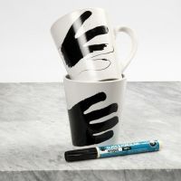 A Mug with a Marker Drawing