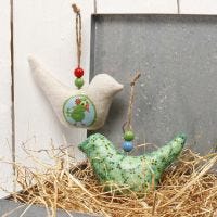 A Fabric Bird for hanging, decorated with Decoupage Paper & Beads
