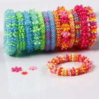 Rainbow bracelets from flat plastic beads