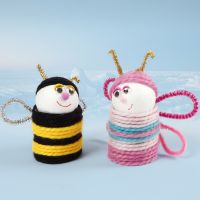 Insects from cardboard tubes and polystyrene balls covered with yarn